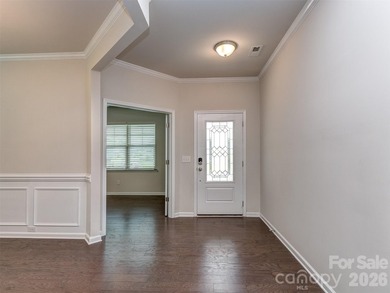 Welcome home to Killian Creek! Large, rocking chair, covered on Verdict Ridge Golf and Country Club in North Carolina - for sale on GolfHomes.com, golf home, golf lot