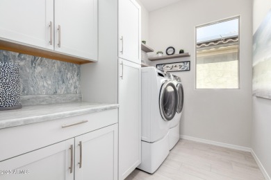 This stunning Journey model is filled with thoughtful upgrades on Copper Canyon Golf Club in Arizona - for sale on GolfHomes.com, golf home, golf lot