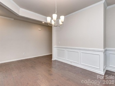 Welcome home to Killian Creek! Large, rocking chair, covered on Verdict Ridge Golf and Country Club in North Carolina - for sale on GolfHomes.com, golf home, golf lot