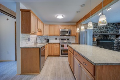 One of the largest homes at Linderhof, this condo has a unique on Linderhof Country Club in New Hampshire - for sale on GolfHomes.com, golf home, golf lot