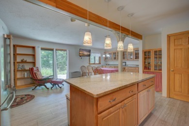 One of the largest homes at Linderhof, this condo has a unique on Linderhof Country Club in New Hampshire - for sale on GolfHomes.com, golf home, golf lot
