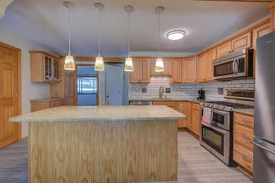 One of the largest homes at Linderhof, this condo has a unique on Linderhof Country Club in New Hampshire - for sale on GolfHomes.com, golf home, golf lot