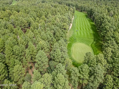 Unbelievable views of the 8th green from the gorgeous deck on White Mountain Country Club in Arizona - for sale on GolfHomes.com, golf home, golf lot