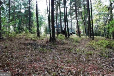 Great building lot with mature timber on a quiet street.  Ideal on Reynolds Lake Oconee - The Preserve in Georgia - for sale on GolfHomes.com, golf home, golf lot