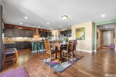 Welcome to this beautifully appointed 4-bedroom, 3-bathroom home on Somersett Country Club in Nevada - for sale on GolfHomes.com, golf home, golf lot