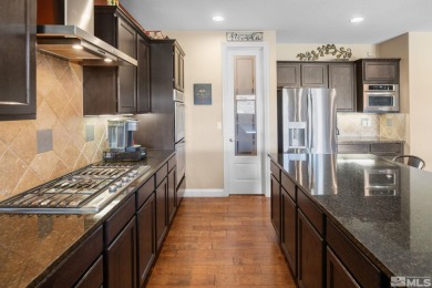 Welcome to this beautifully appointed 4-bedroom, 3-bathroom home on Somersett Country Club in Nevada - for sale on GolfHomes.com, golf home, golf lot