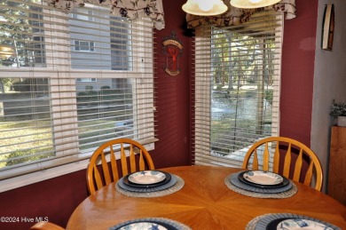 Welcome to this delightful furnished  first-floor 2-bedroom on Oyster Bay Golf Links in North Carolina - for sale on GolfHomes.com, golf home, golf lot