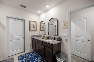 Stunning 4-bedroom, 2-bath split floor plan home in gated Lake on Lake Diamond Golf and Country Club in Florida - for sale on GolfHomes.com, golf home, golf lot