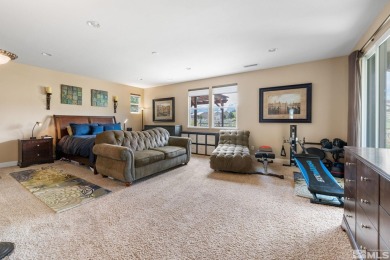 Welcome to this beautifully appointed 4-bedroom, 3-bathroom home on Somersett Country Club in Nevada - for sale on GolfHomes.com, golf home, golf lot