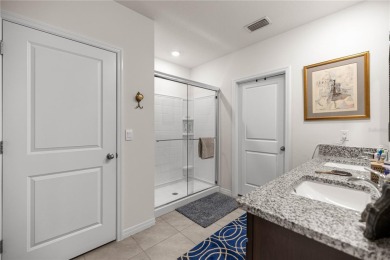 Stunning 4-bedroom, 2-bath split floor plan home in gated Lake on Lake Diamond Golf and Country Club in Florida - for sale on GolfHomes.com, golf home, golf lot