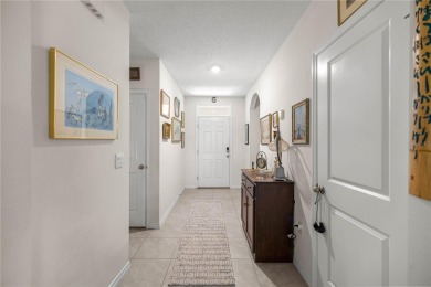 Stunning 4-bedroom, 2-bath split floor plan home in gated Lake on Lake Diamond Golf and Country Club in Florida - for sale on GolfHomes.com, golf home, golf lot