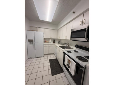 Building offers resort style amenities, such as two pools on Turnberry Isle Resort and Club in Florida - for sale on GolfHomes.com, golf home, golf lot