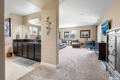 Welcome to this beautifully appointed 4-bedroom, 3-bathroom home on Somersett Country Club in Nevada - for sale on GolfHomes.com, golf home, golf lot