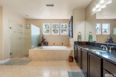Welcome to this beautifully appointed 4-bedroom, 3-bathroom home on Somersett Country Club in Nevada - for sale on GolfHomes.com, golf home, golf lot