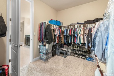 Welcome to this beautifully appointed 4-bedroom, 3-bathroom home on Somersett Country Club in Nevada - for sale on GolfHomes.com, golf home, golf lot