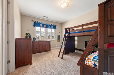 Welcome to this beautifully appointed 4-bedroom, 3-bathroom home on Somersett Country Club in Nevada - for sale on GolfHomes.com, golf home, golf lot