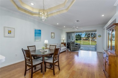 Live your best Florida life in this cheerful and easy-living on The Groves Golf and Country Club in Florida - for sale on GolfHomes.com, golf home, golf lot