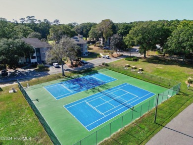 Welcome to this delightful furnished  first-floor 2-bedroom on Oyster Bay Golf Links in North Carolina - for sale on GolfHomes.com, golf home, golf lot