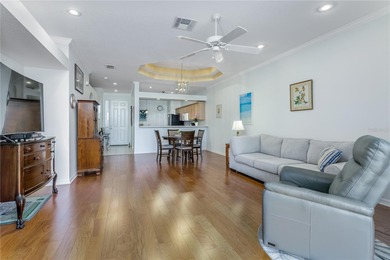 Live your best Florida life in this cheerful and easy-living on The Groves Golf and Country Club in Florida - for sale on GolfHomes.com, golf home, golf lot