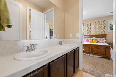 Welcome to this beautifully appointed 4-bedroom, 3-bathroom home on Somersett Country Club in Nevada - for sale on GolfHomes.com, golf home, golf lot