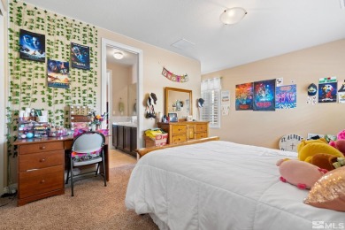 Welcome to this beautifully appointed 4-bedroom, 3-bathroom home on Somersett Country Club in Nevada - for sale on GolfHomes.com, golf home, golf lot