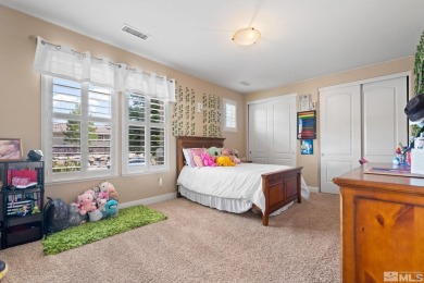 Welcome to this beautifully appointed 4-bedroom, 3-bathroom home on Somersett Country Club in Nevada - for sale on GolfHomes.com, golf home, golf lot