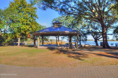 Welcome to this delightful furnished  first-floor 2-bedroom on Oyster Bay Golf Links in North Carolina - for sale on GolfHomes.com, golf home, golf lot