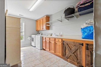 Looking for a beautiful, enormous house in the golf on Bridgemill Golf Club in Georgia - for sale on GolfHomes.com, golf home, golf lot