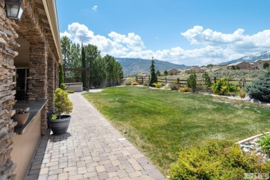 Welcome to this beautifully appointed 4-bedroom, 3-bathroom home on Somersett Country Club in Nevada - for sale on GolfHomes.com, golf home, golf lot