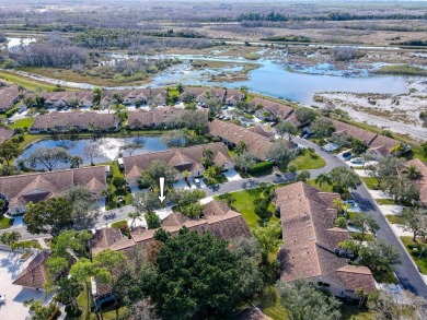 Just steps from the pool, this beautifully maintained 2-bedroom on PGA National Golf Club in Florida - for sale on GolfHomes.com, golf home, golf lot