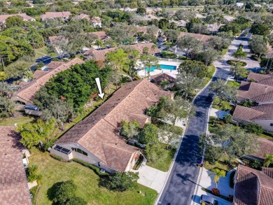 Just steps from the pool, this beautifully maintained 2-bedroom on PGA National Golf Club in Florida - for sale on GolfHomes.com, golf home, golf lot