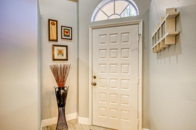 Just steps from the pool, this beautifully maintained 2-bedroom on PGA National Golf Club in Florida - for sale on GolfHomes.com, golf home, golf lot