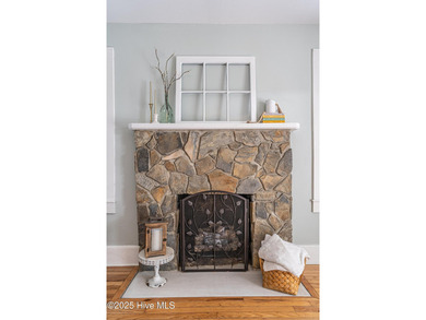 Look at this charming historic home with modern updates on an on Whispering Woods in North Carolina - for sale on GolfHomes.com, golf home, golf lot