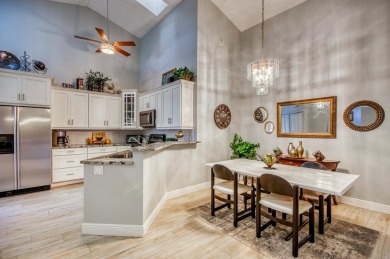 Just steps from the pool, this beautifully maintained 2-bedroom on PGA National Golf Club in Florida - for sale on GolfHomes.com, golf home, golf lot