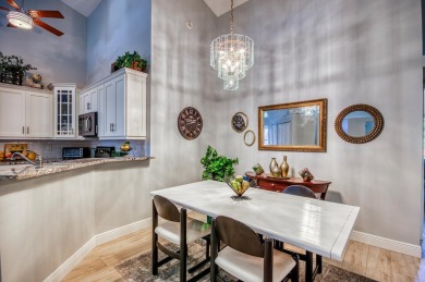 Just steps from the pool, this beautifully maintained 2-bedroom on PGA National Golf Club in Florida - for sale on GolfHomes.com, golf home, golf lot