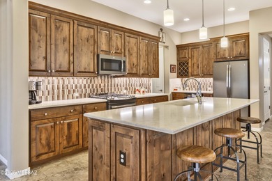 This barely-lived-in Lago villa offers extra square footage and on Saddlebrooke Ranch Golf Club in Arizona - for sale on GolfHomes.com, golf home, golf lot