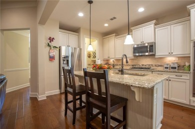 Discover easy living in this beautifully designed four bedroom on Lanier Island Legacy Golf Couorse in Georgia - for sale on GolfHomes.com, golf home, golf lot