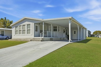 LIVE THE FLORIDA LIFESTYLE you have been dreaming of in this on Brookridge Country Club in Florida - for sale on GolfHomes.com, golf home, golf lot