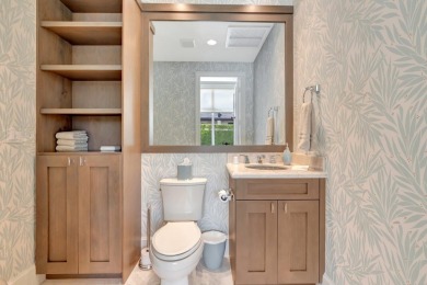 This magnificent home in Windsor Bay is the most desirable on Woodfield Country Club in Florida - for sale on GolfHomes.com, golf home, golf lot