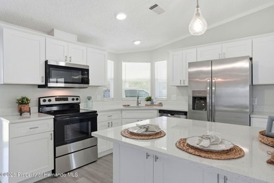 LIVE THE FLORIDA LIFESTYLE you have been dreaming of in this on Brookridge Country Club in Florida - for sale on GolfHomes.com, golf home, golf lot