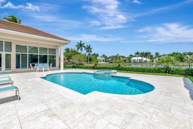 This magnificent home in Windsor Bay is the most desirable on Woodfield Country Club in Florida - for sale on GolfHomes.com, golf home, golf lot