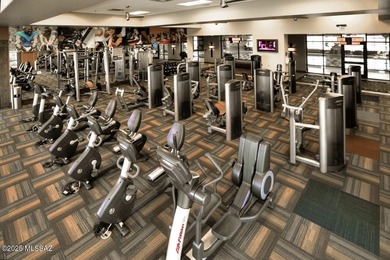 This barely-lived-in Lago villa offers extra square footage and on Saddlebrooke Ranch Golf Club in Arizona - for sale on GolfHomes.com, golf home, golf lot