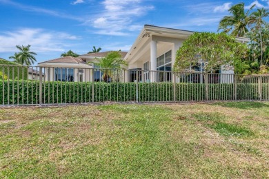 This magnificent home in Windsor Bay is the most desirable on Woodfield Country Club in Florida - for sale on GolfHomes.com, golf home, golf lot