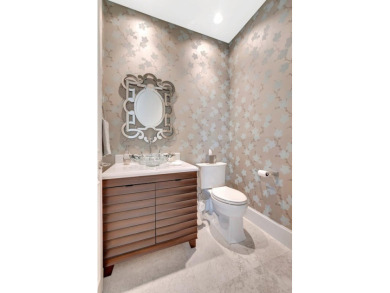 This magnificent home in Windsor Bay is the most desirable on Woodfield Country Club in Florida - for sale on GolfHomes.com, golf home, golf lot