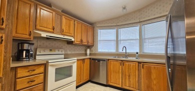 MODERN, Stunning 2 bedroom 2 bath home in 55 + Resort style on Zephyrhills Municipal Golf Course in Florida - for sale on GolfHomes.com, golf home, golf lot