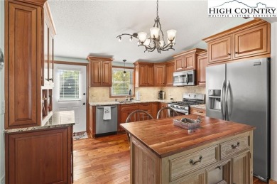 Ready to simplify your life? Check out this spacious mountain on Land Harbor Golf Course in North Carolina - for sale on GolfHomes.com, golf home, golf lot