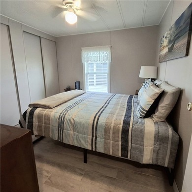 Meticulously maintained home in Barefoot Bay. 2BD/2BA fully on Barefoot Bay Golf Course in Florida - for sale on GolfHomes.com, golf home, golf lot