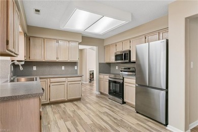 Welcome to this beautifully updated 2-bedroom, 2.5-bath home in on Kiln Creek Golf and Country Club in Virginia - for sale on GolfHomes.com, golf home, golf lot