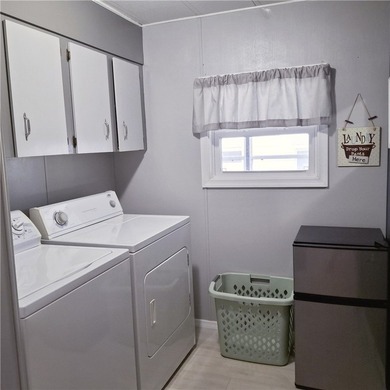 Meticulously maintained home in Barefoot Bay. 2BD/2BA fully on Barefoot Bay Golf Course in Florida - for sale on GolfHomes.com, golf home, golf lot