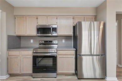 Welcome to this beautifully updated 2-bedroom, 2.5-bath home in on Kiln Creek Golf and Country Club in Virginia - for sale on GolfHomes.com, golf home, golf lot